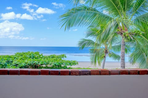 On the beach, sun loungers, beach towels