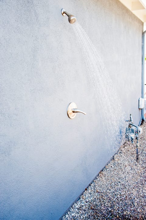 Outdoor shower on side yard