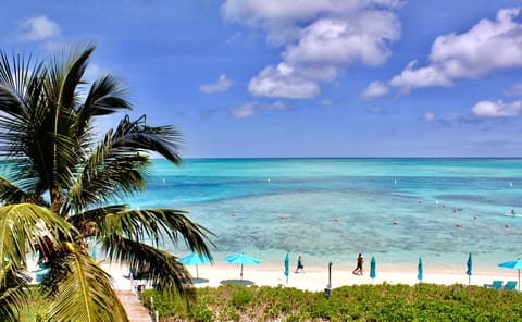 On the beach, sun loungers, beach towels