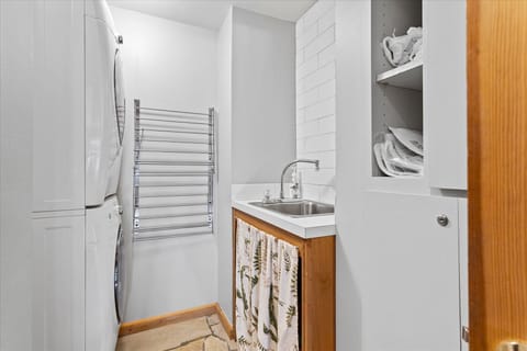 Combined shower/tub, hair dryer, towels, soap