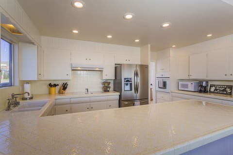 Great counter space and well equipped kitchen for cooking your favorite meals.
