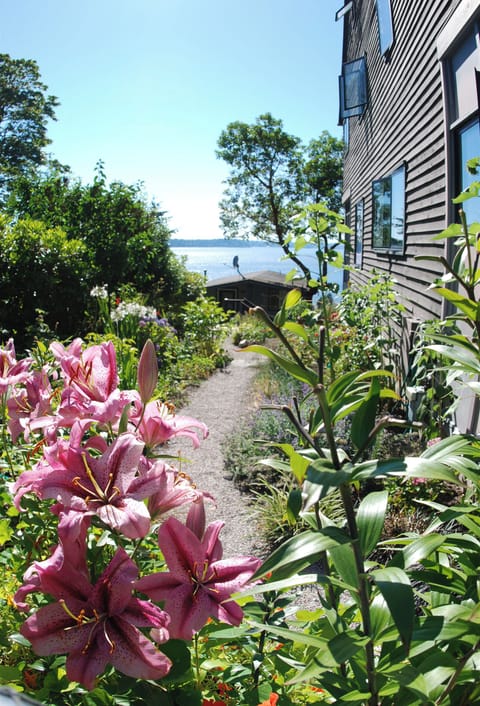 The garden path leads to your own private patio & entrance. Note the water view.