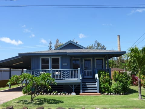 Beautiful yard with fenced rear and covered carport