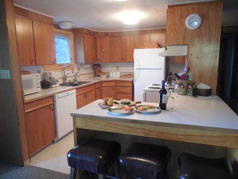 Kitchen..electric range, refrigerator, dish washer, microwave, coffee maker
