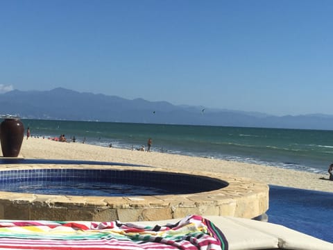 On the beach, sun loungers, beach towels