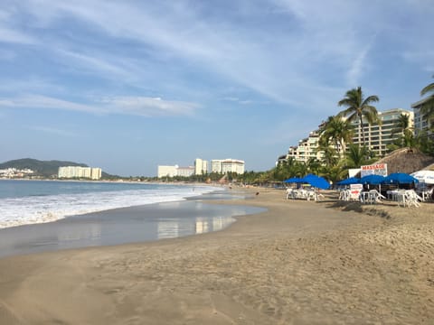 On the beach, sun loungers, beach towels