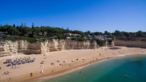 On the beach, sun loungers