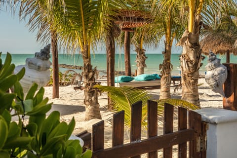 On the beach, sun loungers, beach towels