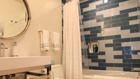Downstairs Bathroom with shower/tub combo.