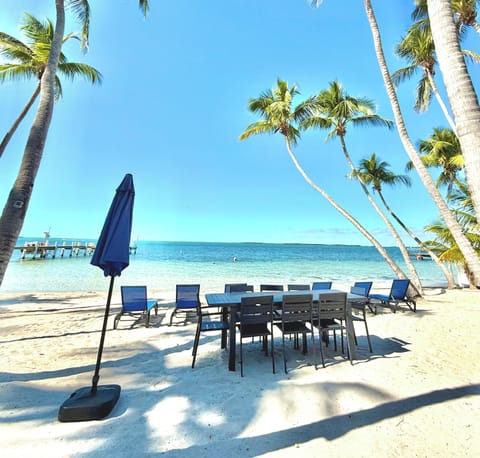 On the beach, sun loungers, beach towels