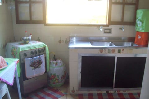 Fridge, microwave, coffee/tea maker, cookware/dishes/utensils