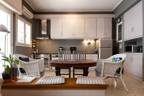 Fully equipped kitchen with antique dining table