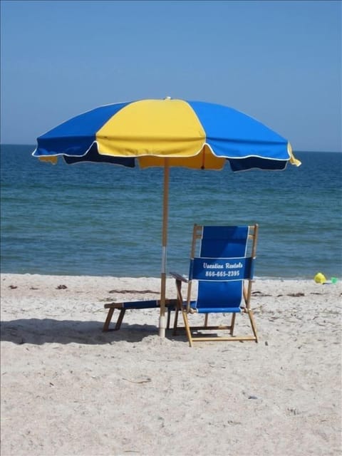 On the beach, sun loungers, beach towels