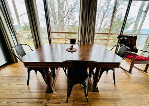 Dining area - Surrounded by a wall of windows to enjoy more of the views!