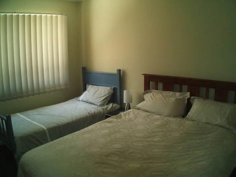 Iron/ironing board, travel crib, bed sheets
