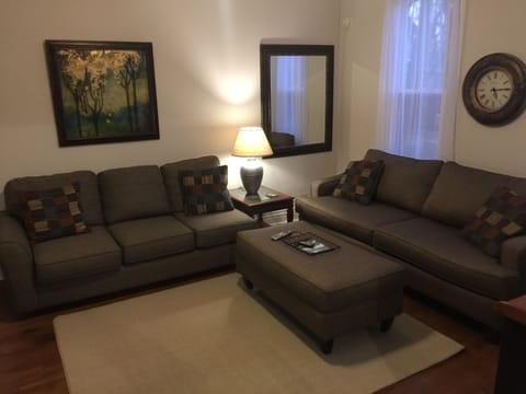 Spacious living room with hardwood floors