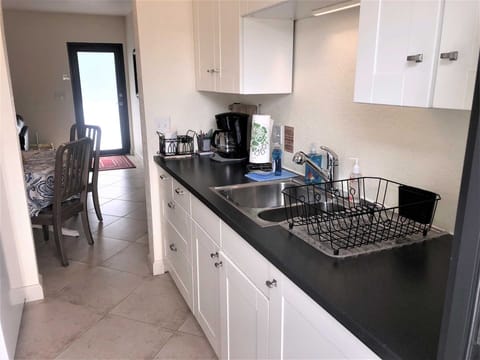 Kitchen has all the necessities -blender,coffeemaker,microwave etc