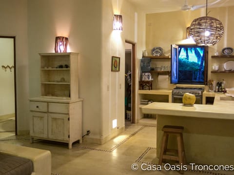 Casa Oasis downstairs flat kitchen and living area (second bath on far left)