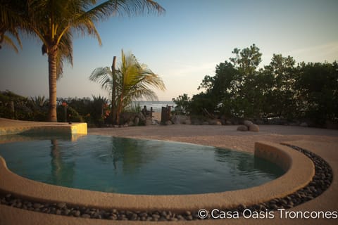 The plunge pool and beach view at Casa Oasis TronconesTroncones