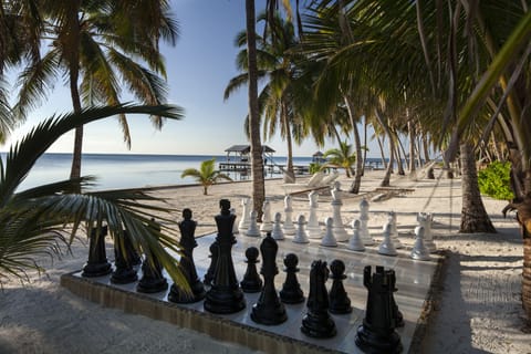 On the beach, sun loungers, beach towels