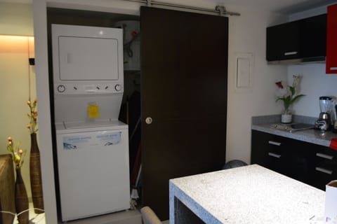 Fridge, microwave, stovetop, coffee/tea maker