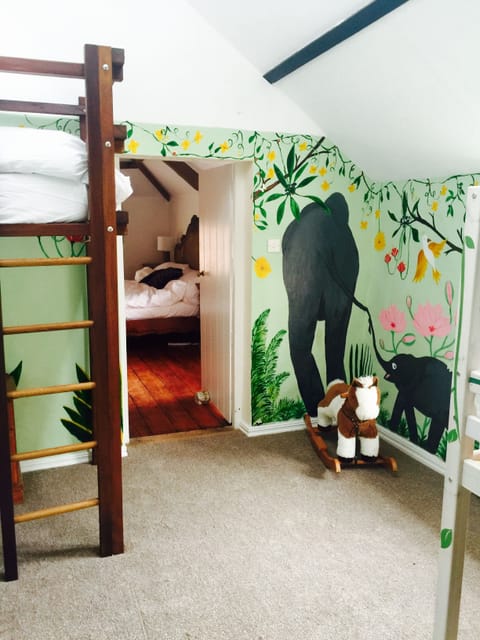 jungle room, leading to safari room.