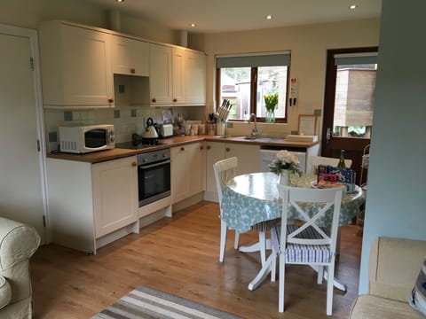 Open plan lounge, kitchen, diner. Microwave, washer dryer and dish washer.