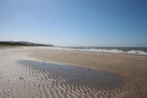 On the beach, sun loungers