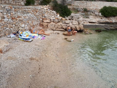 On the beach, sun loungers