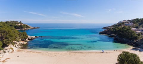 On the beach, sun loungers, beach towels