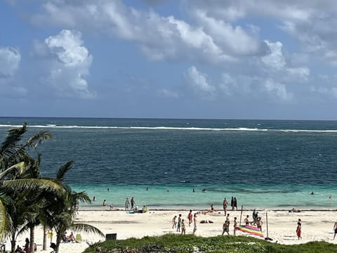 On the beach, sun loungers, beach towels