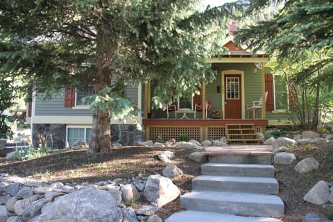 Front of cottage with views of the Continental Divide and Sunrise Peak.