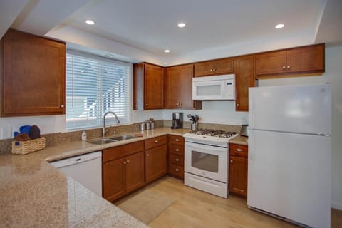 Kitchen is fully-stocked with dishes, cooking, baking and meal prep gear. All standard large and small appliances included. See listing description.