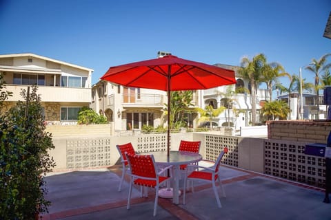 Designated patio table, seating and umbrella for this downstairs unit, along with BBQ grill.
