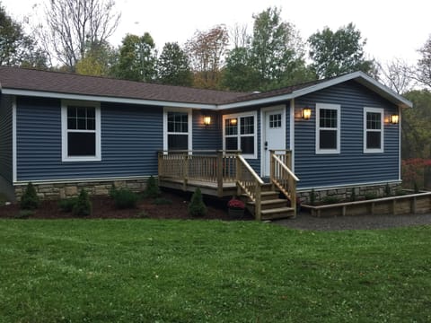 Front porch and entrance with digital keypad. 