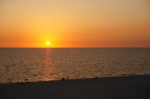 On the beach, sun loungers, beach towels