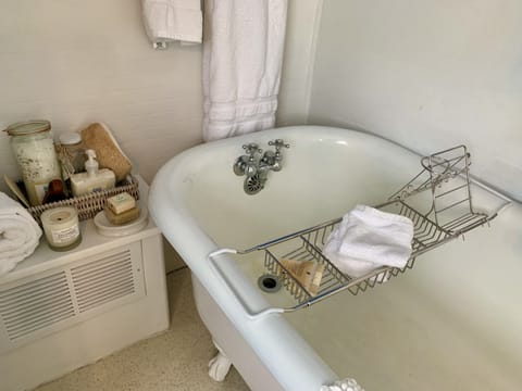 Combined shower/tub, hair dryer, towels, soap