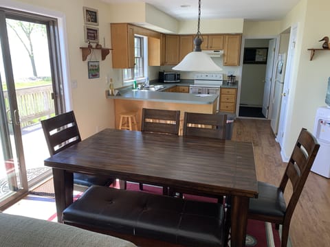 Dining area and kitchen overlooking lake