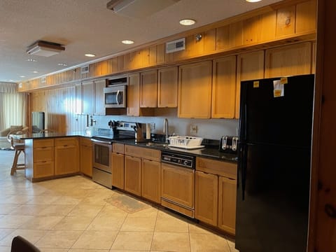 Fridge, microwave, dishwasher, dining tables