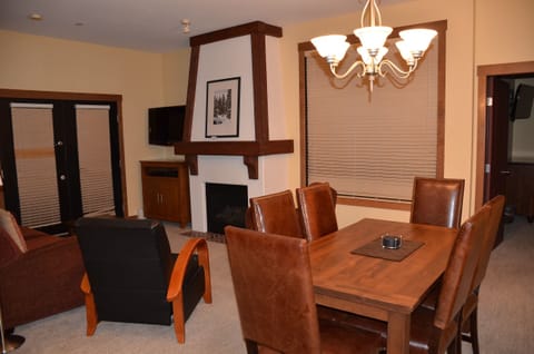 Living / Dining Room with Fireplace & Sleeper Sofa