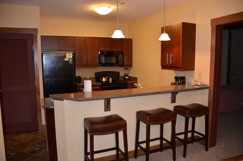 Updated Kitchen with Granite Counter tops / New Bar stools / Slate Floors