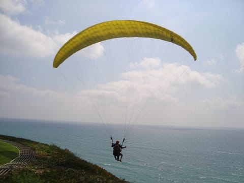 Paragliding, boating and other water activities available nearby.