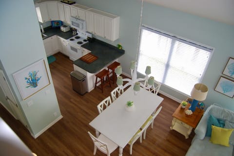 View of Kitchen and Dining from Top of Stairs