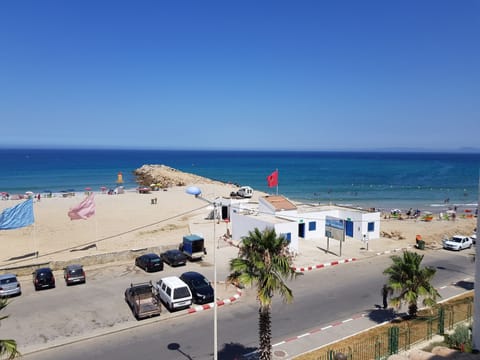 On the beach, sun loungers, beach towels