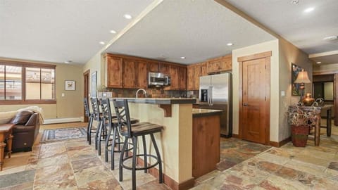 Beautiful kitchen equipped with microwave and refrigerator