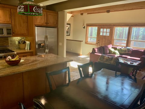 Dining area, kitchen, and living room