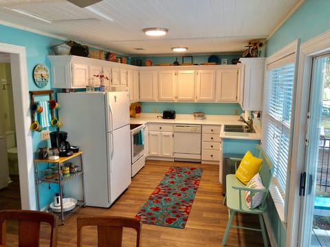 This great kitchen has it all from meal prep to morning coffee or evening wine  