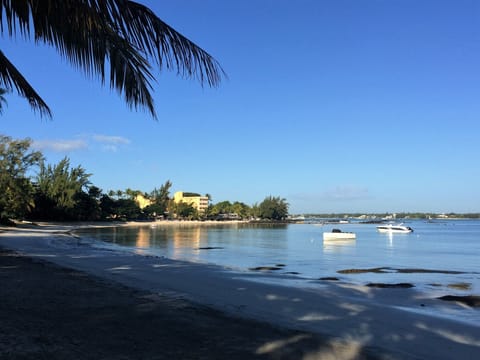 On the beach, sun loungers, beach towels