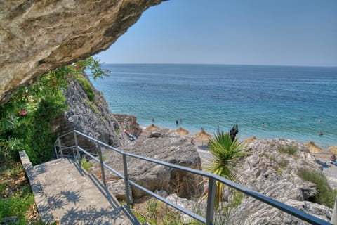 Beach nearby, sun loungers