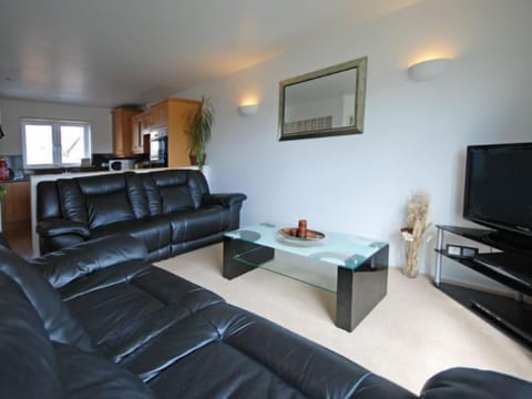 Open plan living area with fully reclinable electric sofas